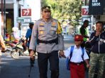 Kapolresta Solo, Kombes Pol Iwan Saktiadi saat mengantar Lana di hari pertama sekolah, Senin 17 Juli 2023.